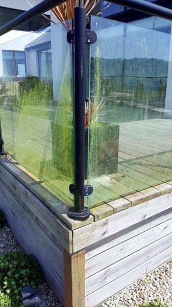 Decking and glass balustrade on a modern home