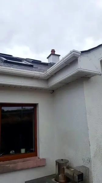 Clean white fascia and soffit on a house after cleaning