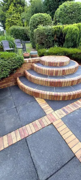 Clean patio with curved brick steps