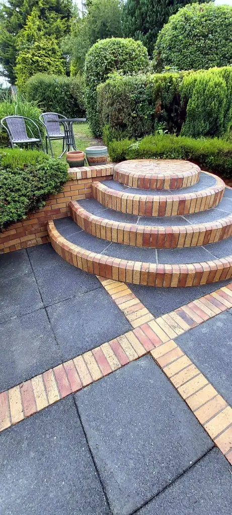 Clean patio with curved brick steps