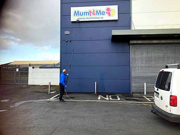Cleaning the high-level cladding of a retail unit